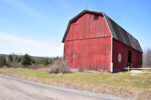 Red barn against a blue sky on Fox Hill Rd