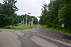 Intersection of 4th St (right), Liebler Hill Rd (left) and E. Branch Bucktooth Hollow Rd (behind). Electric sub-station at the corner.